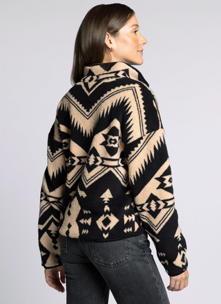 Back view of Canyon Jacket showcasing bold Aztec-inspired pattern.