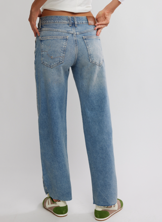 Back view of Free People We the Free Risk Taker Straight Jeans in light wash denim