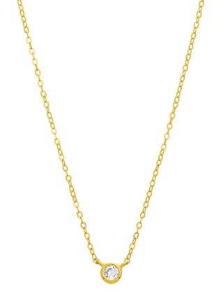 Close-up of gold FYB Marisol Pendant necklace featuring cubic zirconia bezel charm on adjustable chain