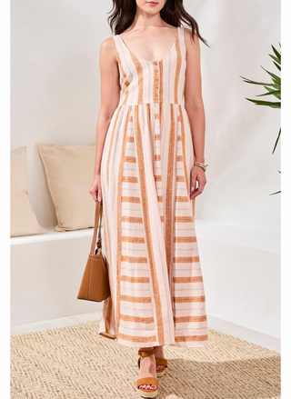 Woman wearing a striped dress in a living room setting