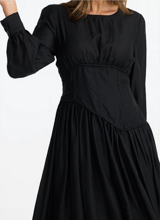 Close-up of asymmetrical corset waist detail on Brave & True Martina Dress