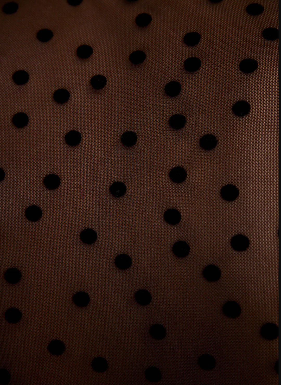Brown fabric with black polka dots
