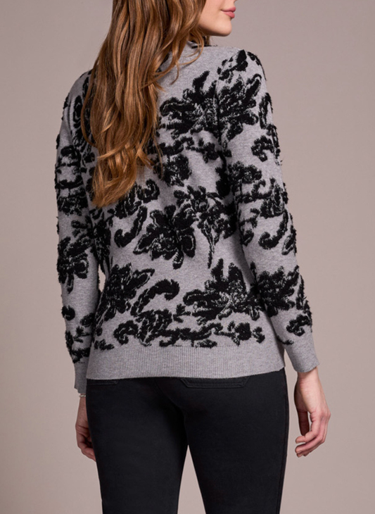 Back view of grey Tribal sweater with textured black floral design and crew neckline.