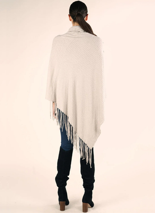 Back view of Carrie Cowl Neck Fringe Poncho showing draped silhouette.