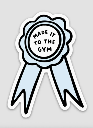 Funny light blue gym ribbon sticker reading “Made It to the Gym” — fitness humor and motivation design.