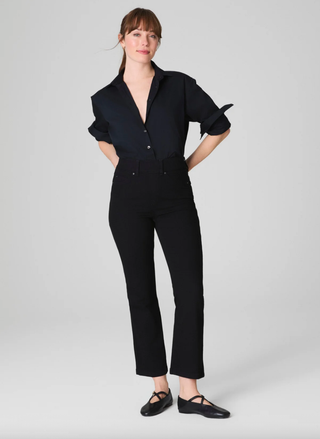 SPANX Kick Flare Jeans in black — high-rise shaping denim with cropped flare leg.
