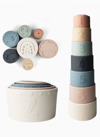 Soft silicone stacking cups for baby bath or beach in neutral pastel colors