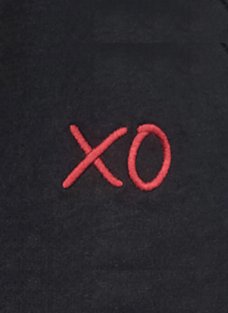 Red 'XO' symbol on a black background