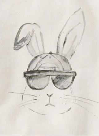 Close-up of hand-painted hip hop bunny graphic on organic cotton baby sweatshirt