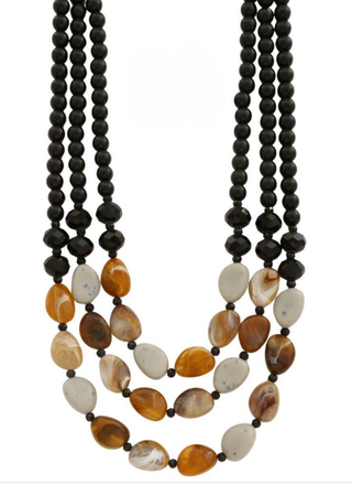 Necklace with black and multicolored beads on a white background