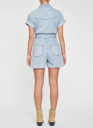 Rear view of the light wash Topanga Romper highlighting the flattering elastic waist and classic pocket detailing.