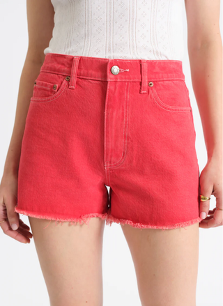 Detailed shot of the Daze Denim Trouble Maker shorts in Chili Pepper red, showcasing the comfort stretch fabric and hardware.