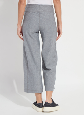 Person wearing gray pants on a white background