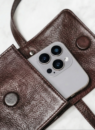 Latico Leather Coffee color purse with a smartphone on a white background