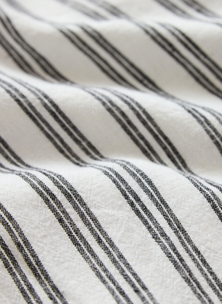 Close-up of fabric with black and white striped pattern