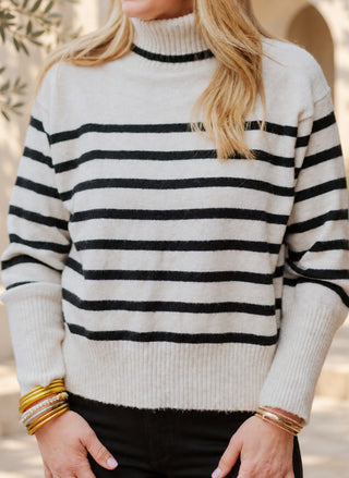 Back view of the Velvet Heart Parley Striped Sweater showing the split back hem detail