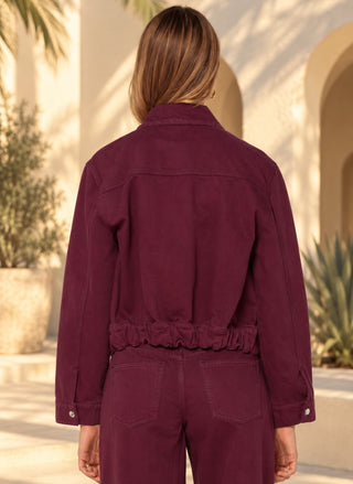 Back view of the Velvet Heart Delphia Denim Jacket in wine wash, showing the cinched elasticized hem