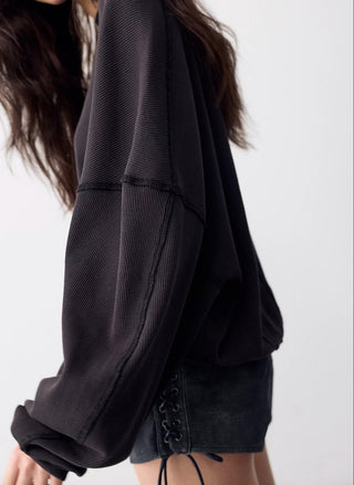 Women's crew neck thermal top from Free People, soft ribbed knit with long sleeves