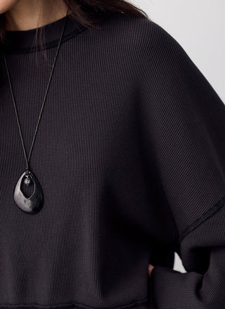 Free People ribbed long sleeve thermal shirt in a relaxed oversized fit for fall layering