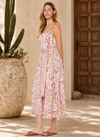 Side profile view of a model wearing the Current Air Medallion Dress cinched at the waist with the matching fabric belt, highlighting the ankle-length midi hem.