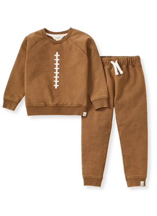 Brown children's sweatshirt and pants set with a football design on a white background