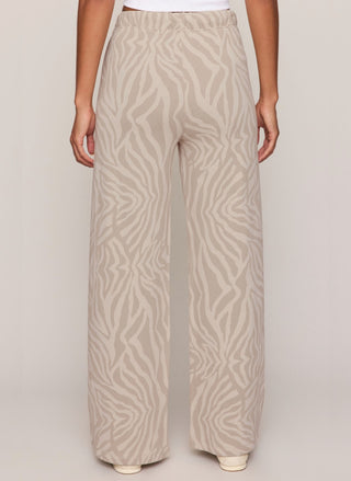 Back view of Z Supply Hunter Zebra Sweatpant in a neutral tonal zebra print.