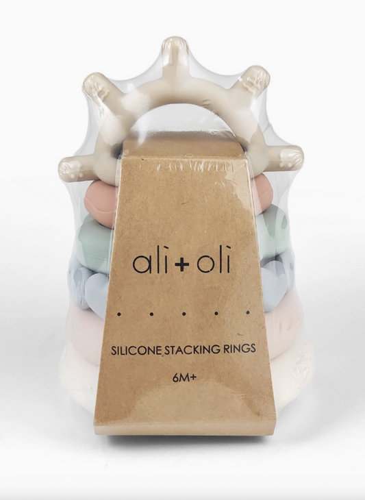 Silicone stacking rings with 'ali+oli' packaging on a white background