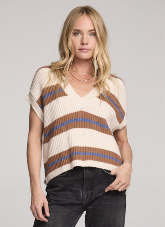Saltwater Luxe Fitz Sweater Top in cream with camel and ocean-blue horizontal stripes, sleeveless V-neck ribbed knit with relaxed boxy fit, styled with black denim jeans for a casual chic look.