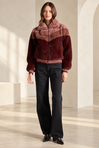 Deep red Saltwater Luxe Kaira faux fur jacket, a bold western-style layer - August Boutique