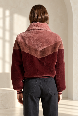 Women's garnet red faux fur jacket by Saltwater Luxe with a sporty silhouette