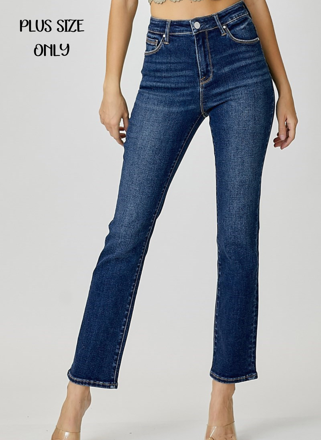 Front view of model wearing dark wash Mid Rise Ankle Straight Slim Denim. White background.