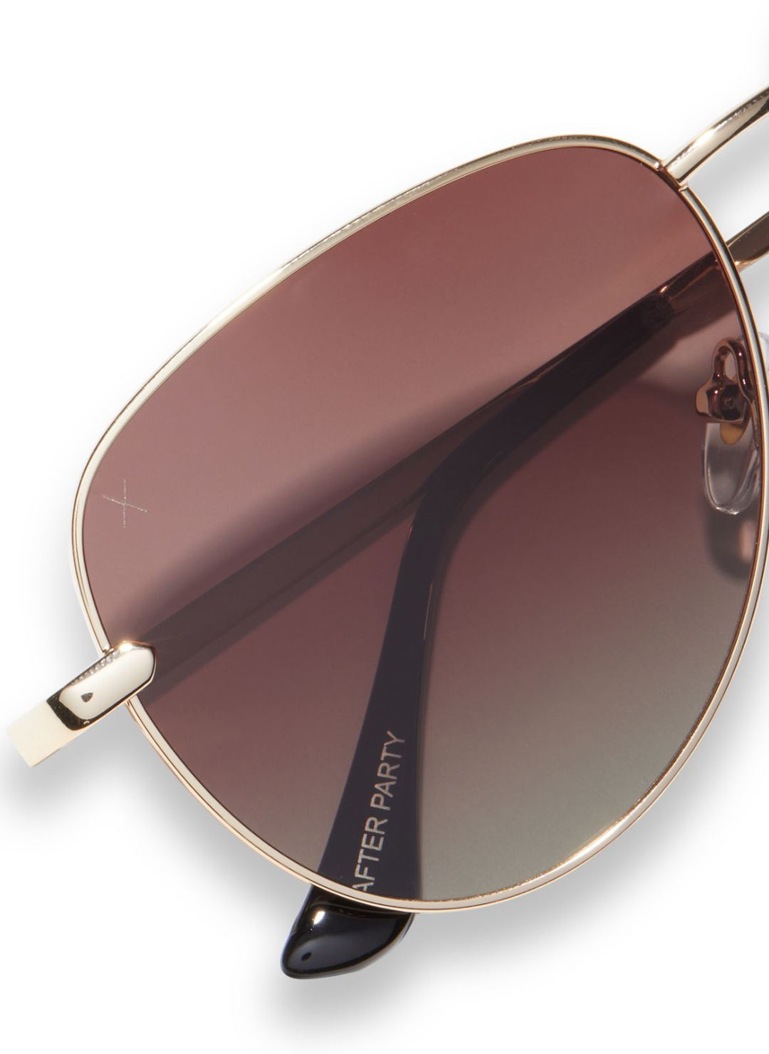 Up close view of brown gradient sunglasses lenses.