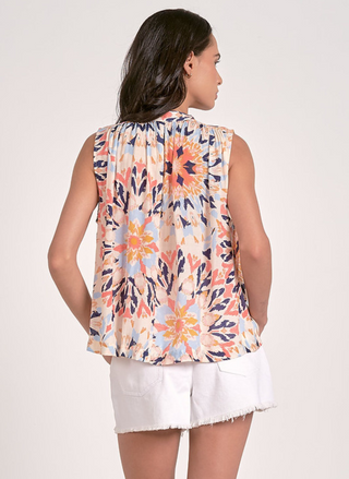 Kaleidoscope Elan sleeveless floral blouse in peach, navy, and coral—August Boutique Ripon. Features keyhole tie-front, lightweight rayon, and relaxed fit. Perfect for summer styling.