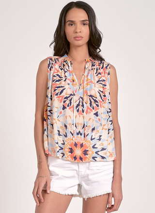Kaleidoscope Elan sleeveless floral blouse in peach, navy, and coral—August Boutique Ripon. Features keyhole tie-front, lightweight rayon, and relaxed fit. Perfect for summer styling.