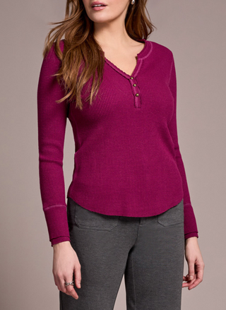 This image features the Tribal Edith Classic Henley, a stylish and versatile piece of attire. The henley is crafted in a soft, plum color, exuding a classic casual elegance.