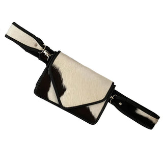 front view of the cow purse and cow strap.