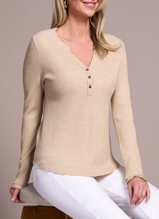 This image features the Tribal Edith Classic Henley, a stylish and versatile piece of attire. The henley is crafted in a soft, neutral beige color, exuding a classic casual elegance.